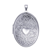P09 – S/S Centre Heart Celtic Design 6 Photo Oval Locket